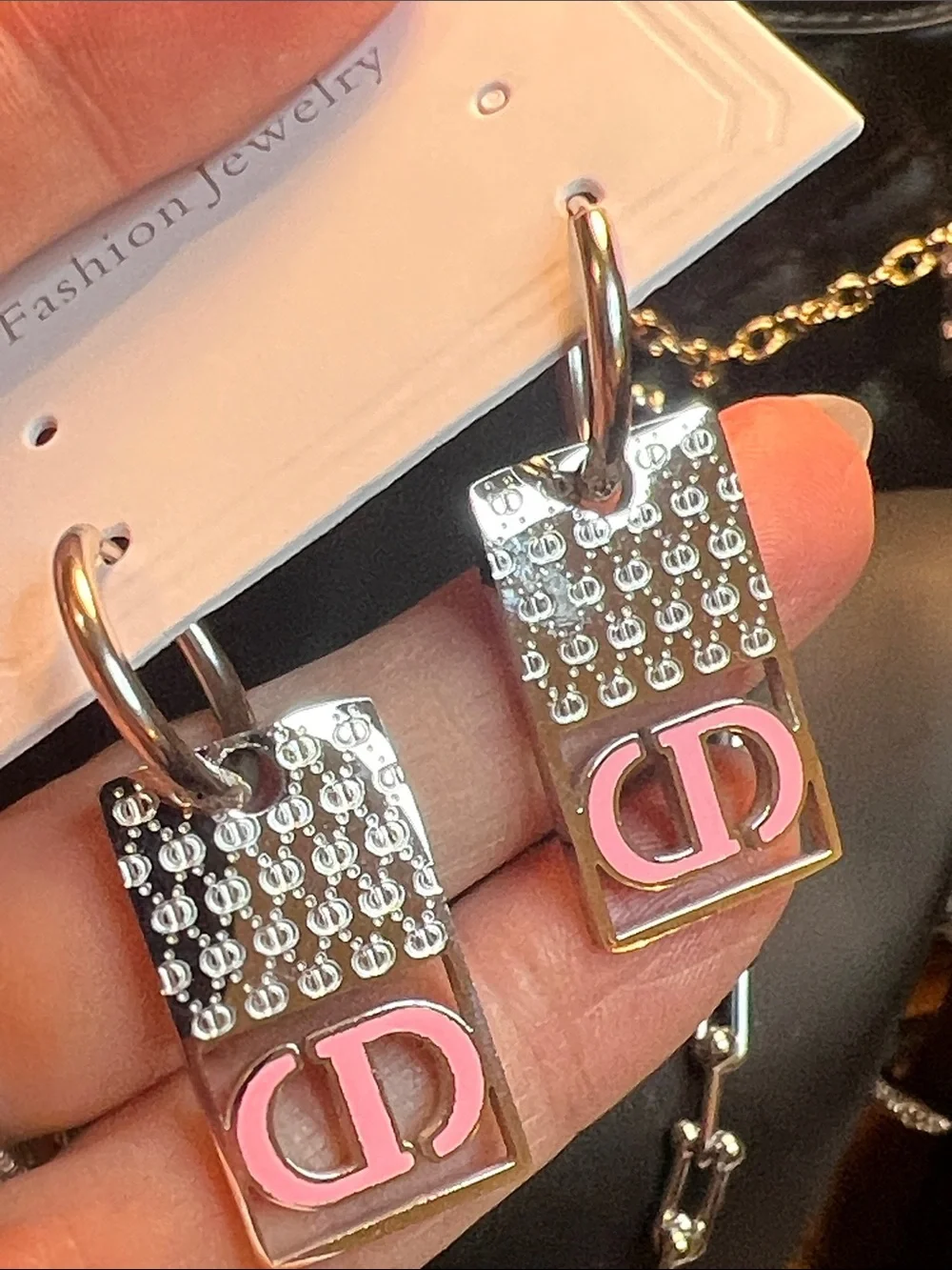 Silver-Tone Earrings with Pink Logo Accent